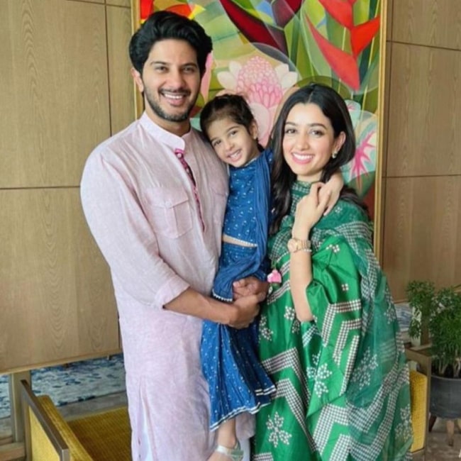 Amal Sufiya as seen in a picture with her husband Dulquer Salmaan and daughter Maryam on Eid in May 2022