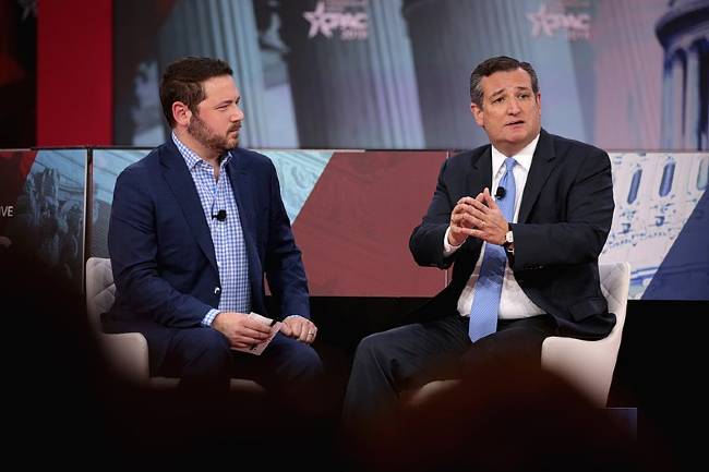 Ben Domenech seen onstage with the Texas Senator Ted Cruz in 2018