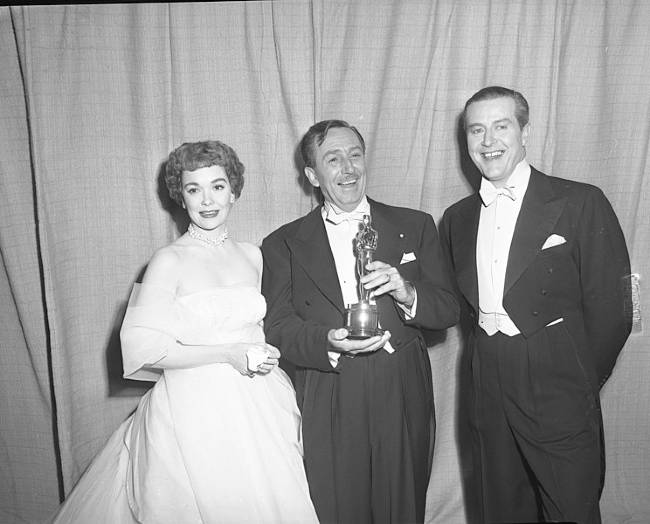 (From left to right) Jane Wyman, Walt Disney, and Ray Milland as seen in 1953