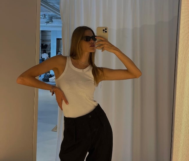 Kim Riekenberg as seen while taking a mirror selfie in July 2022