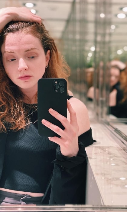 Rhian Blundell as seen while taking a mirror selfie in February 2022