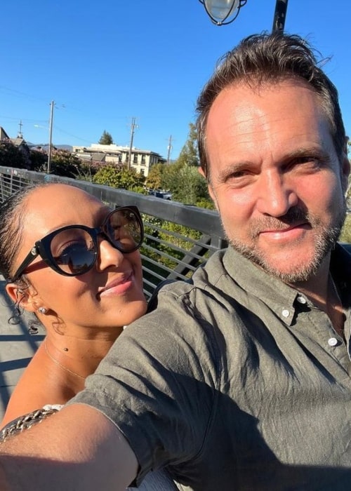 Adam Housley and Tamera Mowry, as seen in August 2022