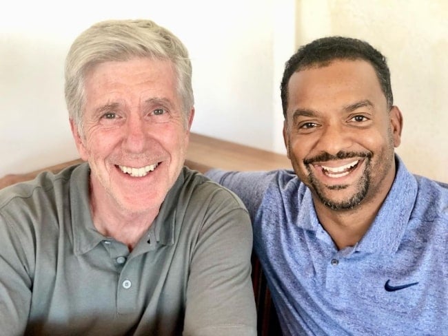 Alfonso Ribeiro (Right) and Tom Bergeron smiling for a picture in September 2022