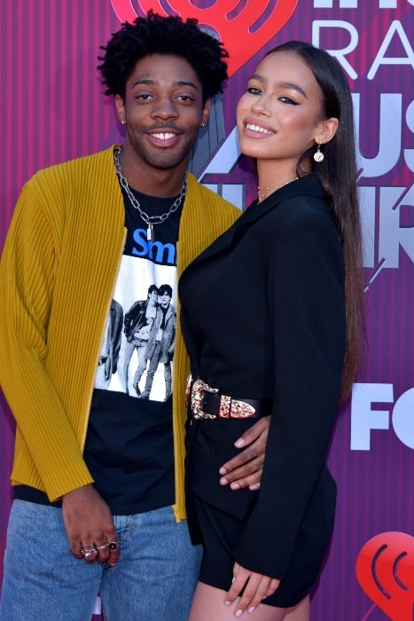 Brent Faiyaz and Zahara Davis smiling for the camera at the 2019 iHeart Music Awards Show in Los Angeles, California