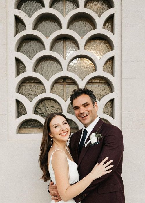 Dana Schwartz as seen with her husband Ian Karmel on their wedding day in 2022