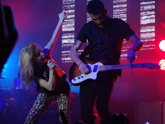 Taylor York seen performing on stage with Hayley Williams in 2013