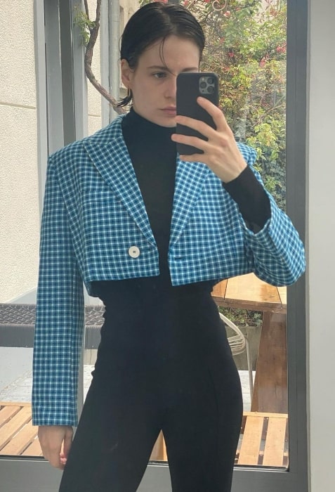 Christine and the Queens as seen while taking a mirror selfie in Paris, France in April 2021
