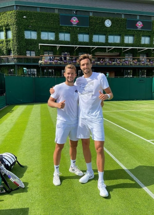 Enzo Couacaud as seen in a picture that was taken at All England Lawn Tennis and Croquet Club in June 2022, with Arthur Rinderknech