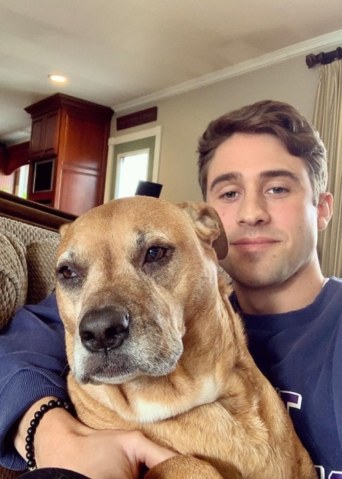 Greg Grippo as seen in a selfie with his dog named rom coms in March 2020