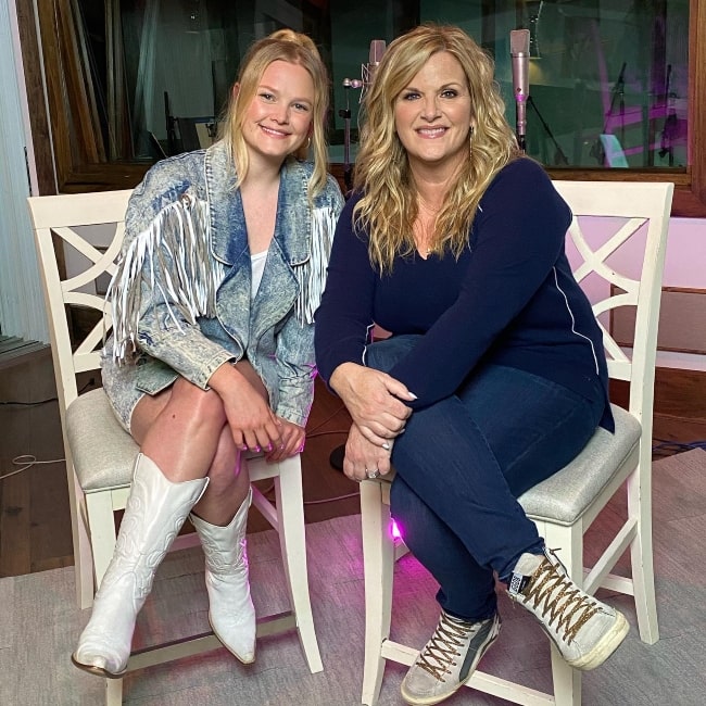 Hailey Whitters (Left) smiling for a picture with Trisha Yearwood in September 2021
