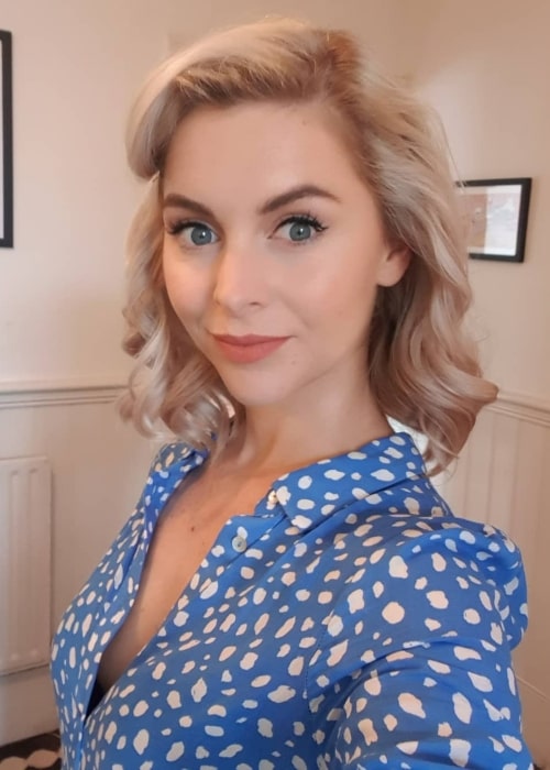 Miranda Hennessy as seen while smiling in a selfie in London, United Kingdom in August 2019