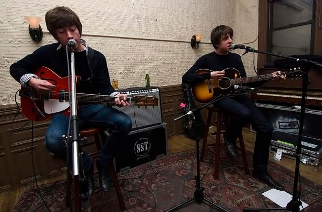 Alex Turner (left) and Miles Kane (right) seen performing as the Last Shadow Puppets in 2008