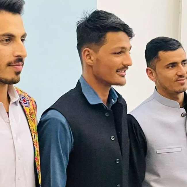 Allah Mohammad Ghazanfar with Mujib Zadran (Right) and Sharafuddin (Left) in a picture taken in March 2022
