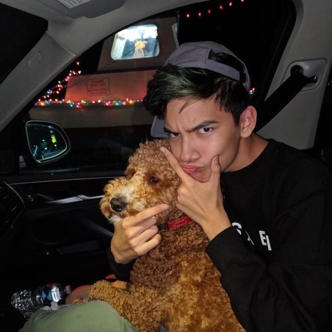 Andrew Burriss with his dog Pogi in August 2019