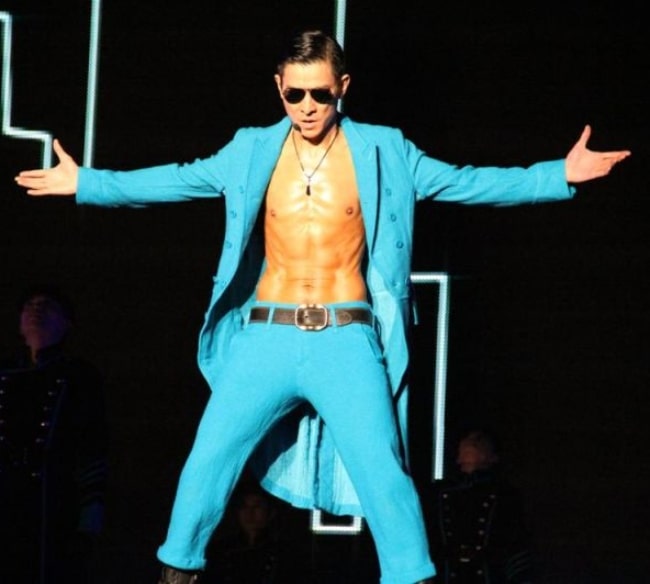 Andy Lau as seen while showcasing his stunning physique during a concert in 2011