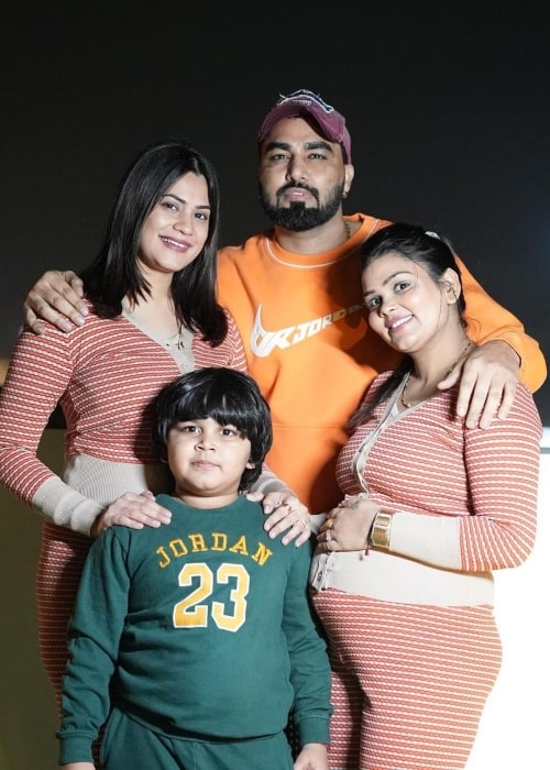 Armaan Malik as seen in a picture with his wives Kritika and Payal and his son Chirayu in December 2022