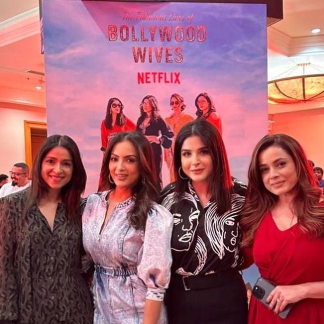 Bhavana Pandey (left) seen posing alongside Seema Sajdeh, Maheep Kapoor, and Neelam Kothari Soni in December 2022