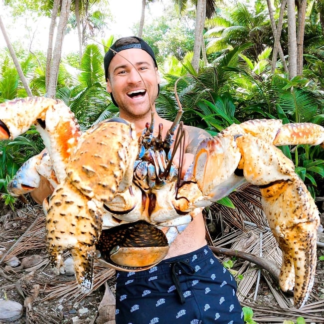 Brodie Moss as seen in a picture with a giant coconut crab in July 2021