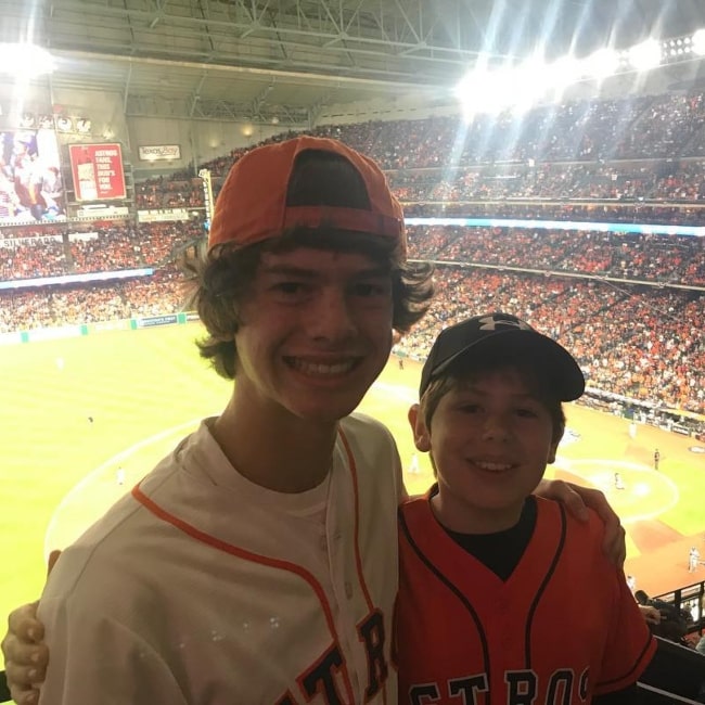 Drew Justice and Cole Justice in a picture that was taken in October 2017, at the World Series