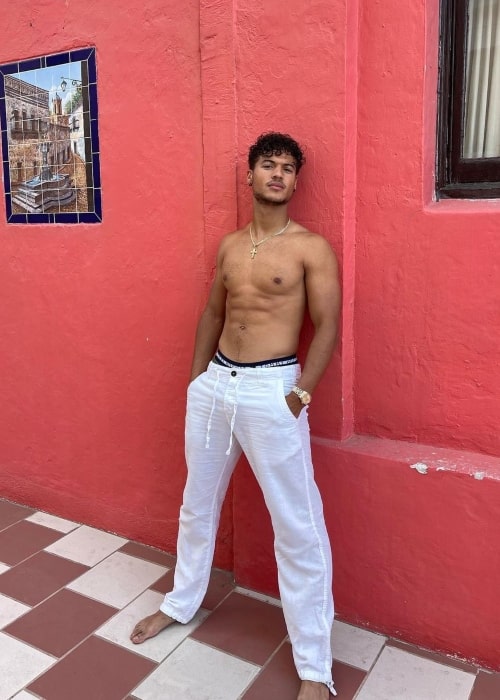 Jan Luis Castellanos posing shirtless for the camera in July 2021