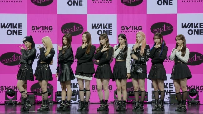 Kep1er members (from Left to Right - Hikaru, Yeseo, Dayeon, Xiaoting, Chaehyun, Yujin, Huening Bahiyyih, Youngeun, and Mashiro) in October 2022