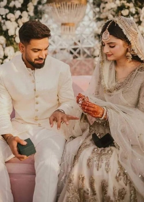 Muzna Masood Malik with her husband Haris Rauf on the day of their wedding in December 2022