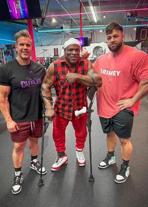 Regan Grimes as seen in a picture with former bodybuilders RonnieDecember Coleman and Jay Cutler in December 2022, in Fit Club, Las Vegas