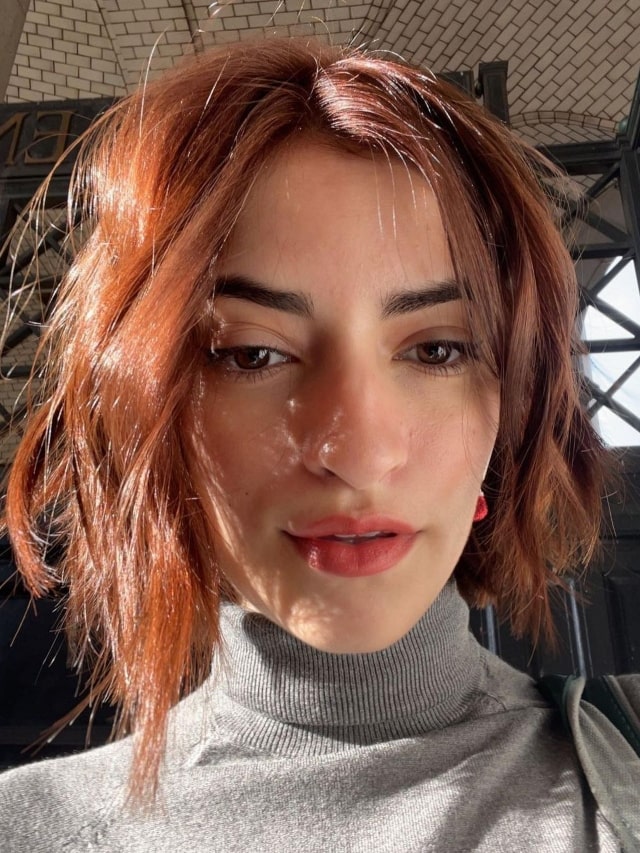 Soni Bringas showing her newly dyed red hair in December 2022