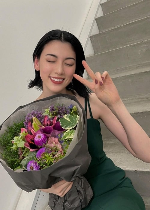 Ayaka Miyoshi smiling for a picture in June 2021