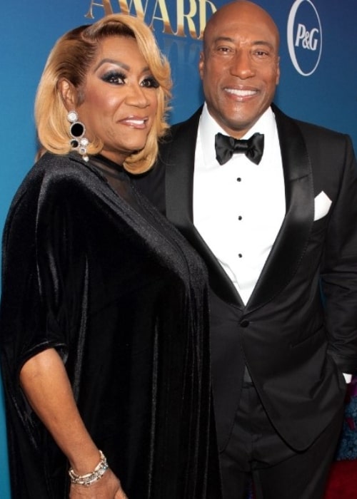 Byron Allen, posing with American singer, songwriter, actress, and businesswoman Patti LaBelle, in November 2022