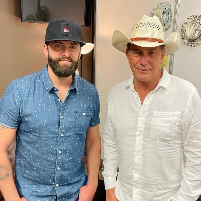 Dean Brody (Left) and Kevin Costner in Calgary, Canada in July 2022