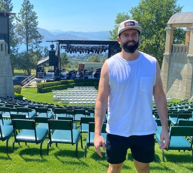 Dean Brody as seen while posing for a picture at Mission Hill Family Estate Winery in July 2022