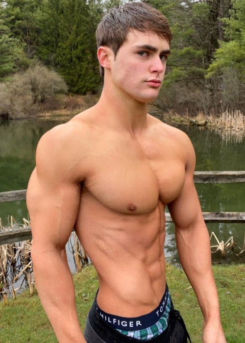 Dylan McKnight as seen while showing his physique in a shirtless picture in May 2022