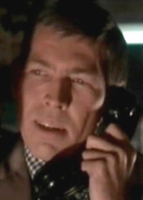 James Coburn as seen in a screenshot from the film 'Charade'