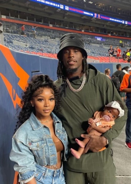 Jerry Jeudy, posing with Antoinette Tharp and their daughter, in October 2022