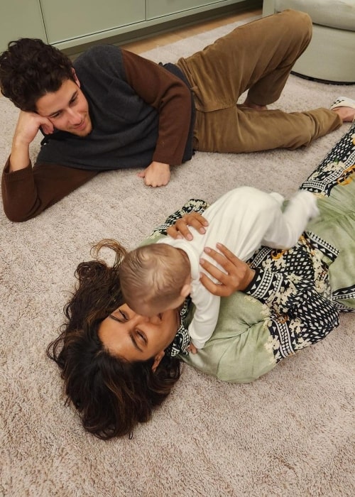 Malti Marie Chopra Jonas as seen in a picture with her mother Priyanka and father Nick Jonas in November 2022, in Los Angeles, California