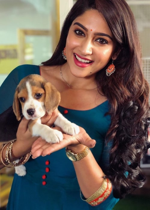 Nishvika Naidu as seen in a picture with a beagle named Charlie in May 2019