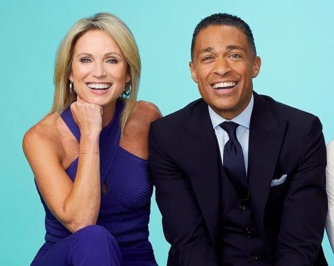 T. J. Holmes as seen smiling in a picture with Amy Robach
