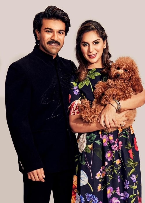 Upasana Kamineni with her husband actor Ram Charan and their dog in December 2022