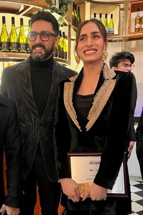 Alina Khan smiling in a picture with Abhishek Bachchan in August 2022