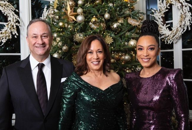 Angela Rye as seen in an Instagram picture with Vice President Kamala Harris and Second Gentleman Doug Emhoff in December 2022