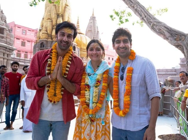 Ayan Mukerji as seen posing for a picture with Alia Bhatt and Ranbir Kapoor in 2022