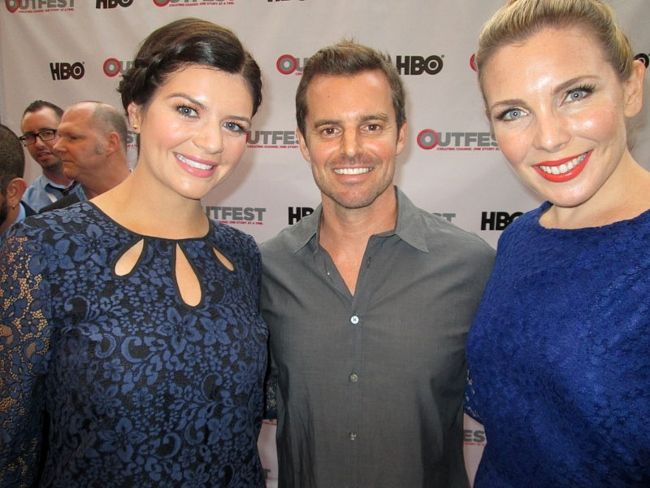 Casey Wilson (left) seen posing for a picture with Chris Nelson and June Diane Raphael in 2013