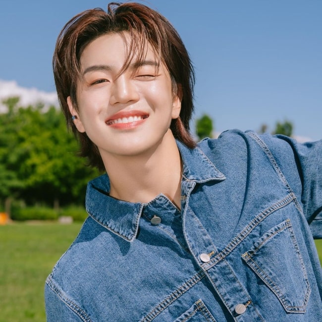 Donghun smiling in an Instagram post in August 2021