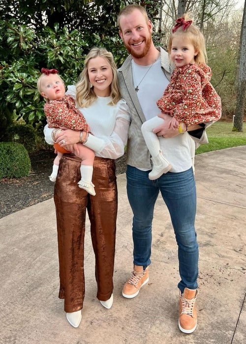 Madison Oberg as seen in a picture with her husband Carson and their girls in January 2023