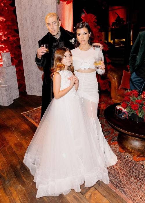 Penelope Disick as seen with her mom Kourtney Kardashian and Travis Barker in December 2022