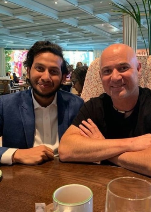 Ritesh Agarwal, posing with tennis legend Andre Agassi, in January 2021