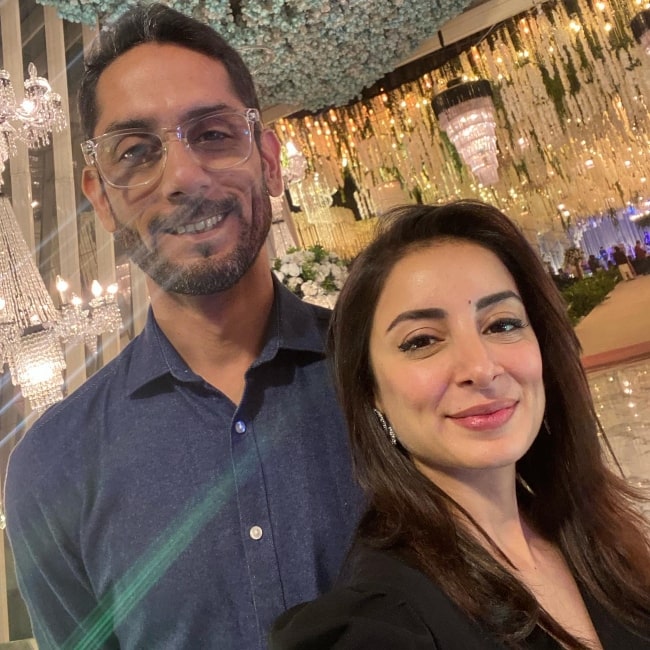 Sarwat Gilani smiling in a picture with her brother S Tariq Shah Gilani in October 2022