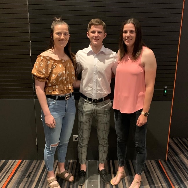 Tahlia McGrath as seen in a picture with her siblings Kayla and Josh McGrath in October 2019