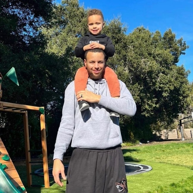 Canon Curry as seen in a picture with his father Stephen Curry in April 2022